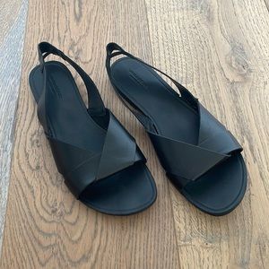 Black leather flats
